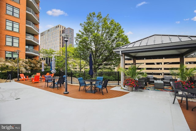 1830 Fountain Dr Unit 1107, Reston, VA 20190 - view of patio with a gazebo and an outdoor living space