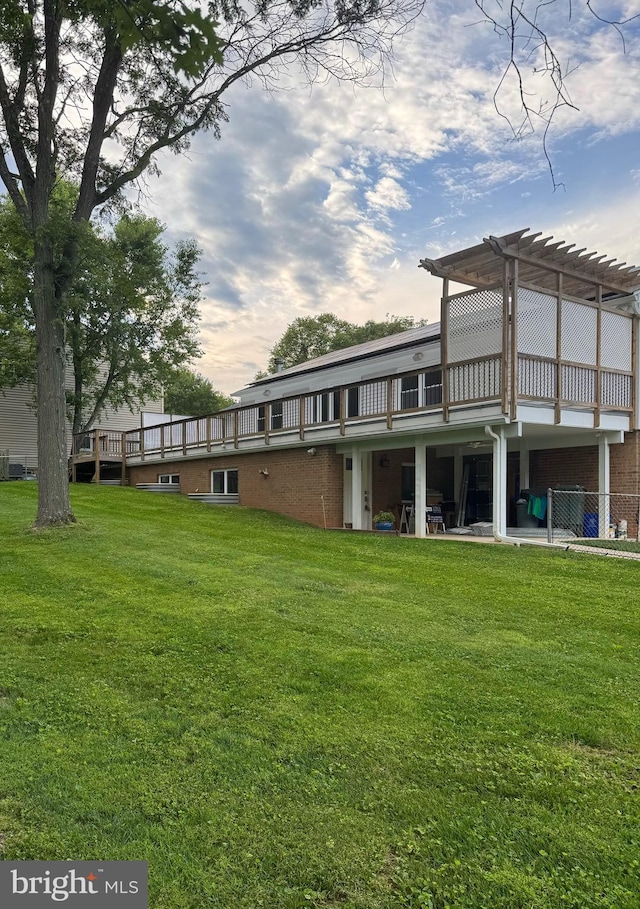 13 Montford Ct, Silver Spring, MD 20905 - rear view of property with a pergola, a yard, and a wooden deck