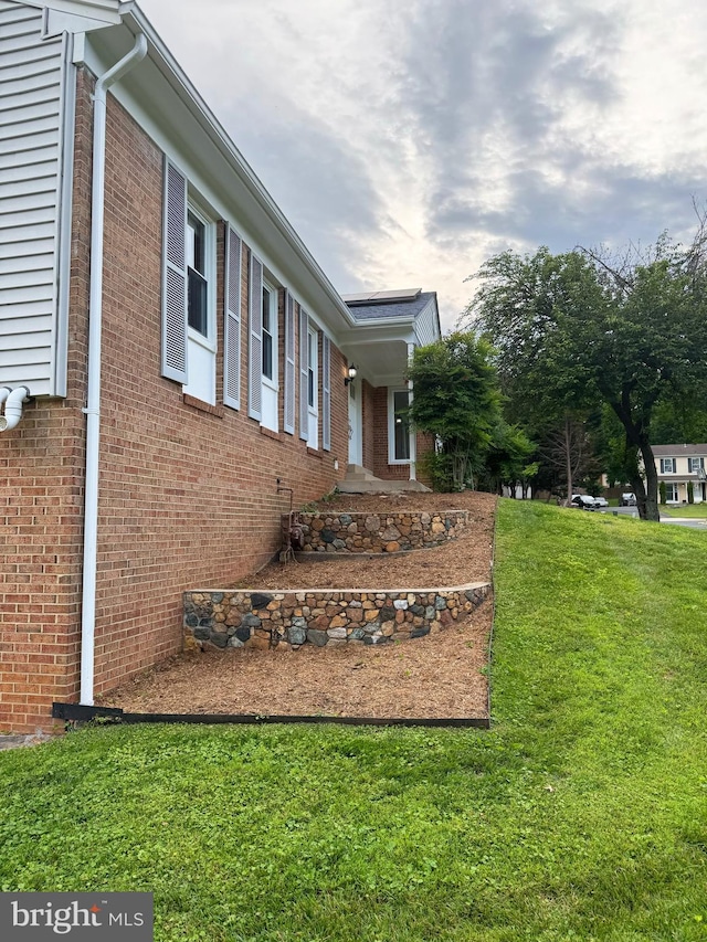 13 Montford Ct, Silver Spring, MD 20905 - view of home's exterior featuring a lawn and brick siding