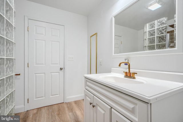 4108 Slater Ave, Baltimore, MD 21236 - bathroom with vanity and wood finished floors