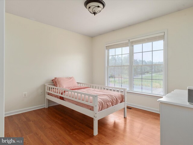 18 Barnett Dr, Front Royal, VA 22630 - bedroom featuring baseboards and wood finished floors