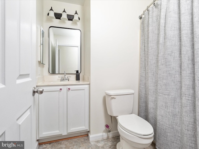 18 Barnett Dr, Front Royal, VA 22630 - bathroom with toilet, vanity, baseboards, and a shower with shower curtain