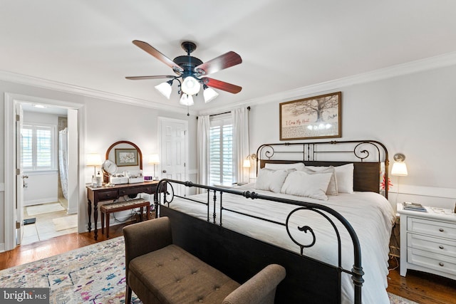 413 Benton Pt, Tappahannock, VA 22560 - bedroom with ornamental molding, multiple windows, wood finished floors, and ceiling fan