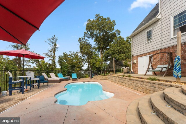413 Benton Pt, Tappahannock, VA 22560 - view of swimming pool featuring a patio
