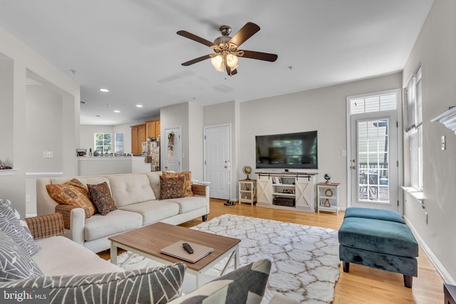 10079 Orland Stone Dr, Bristow, VA 20136 - living area featuring ceiling fan, light wood finished floors, recessed lighting, and baseboards