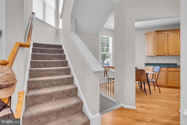 10079 Orland Stone Dr, Bristow, VA 20136 - staircase with wood finished floors and baseboards