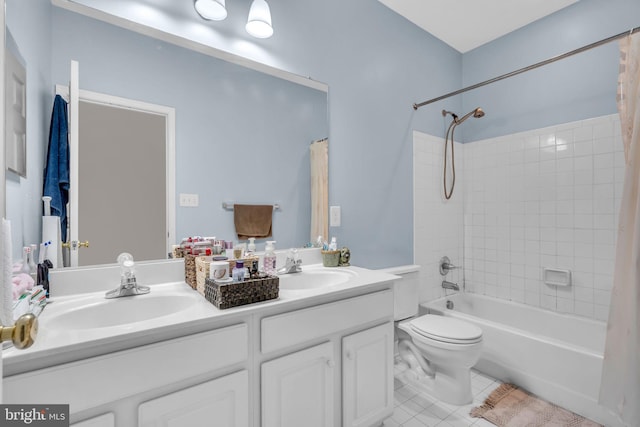 10079 Orland Stone Dr, Bristow, VA 20136 - bathroom with double vanity, tile patterned flooring, toilet, and shower / bath combination with curtain