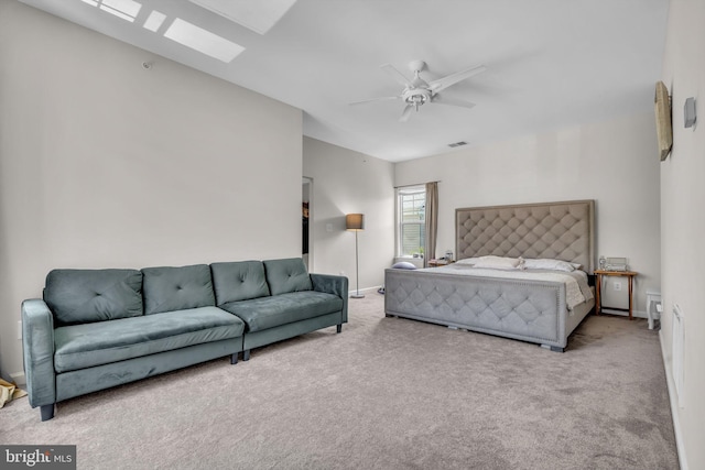 10079 Orland Stone Dr, Bristow, VA 20136 - carpeted bedroom featuring a skylight, ceiling fan, and baseboards