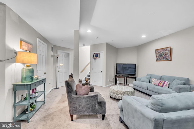 10079 Orland Stone Dr, Bristow, VA 20136 - living room with light colored carpet, recessed lighting, stairway, and baseboards