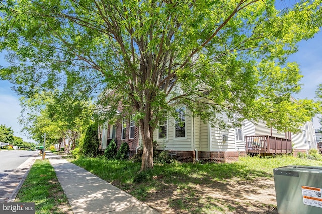 10079 Orland Stone Dr, Bristow, VA 20136 - view of side of property with a wooden deck