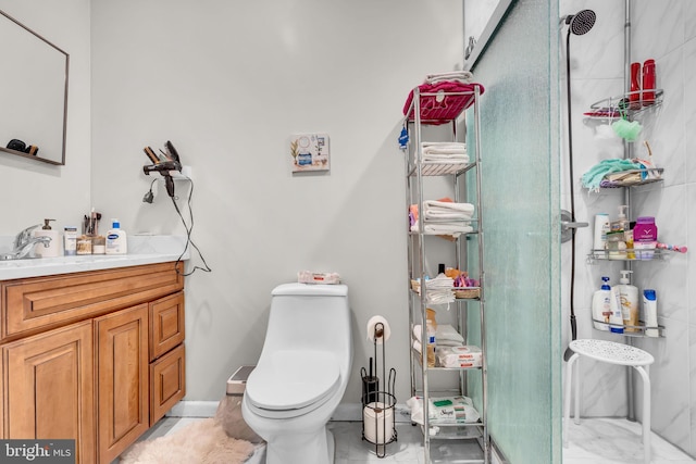 10079 Orland Stone Dr, Bristow, VA 20136 - full bath featuring vanity, a shower stall, toilet, and baseboards
