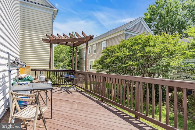 10079 Orland Stone Dr, Bristow, VA 20136 - wooden terrace with a pergola and area for grilling