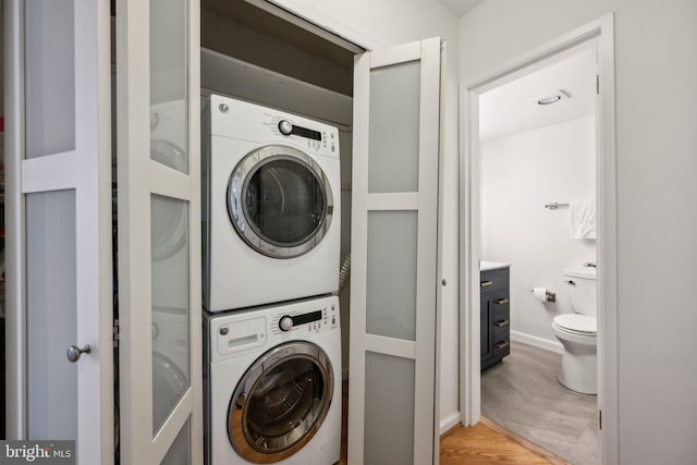2555 Pennsylvania Ave NW Unit 918, Washington, DC 20037 - laundry room with stacked washer and clothes dryer