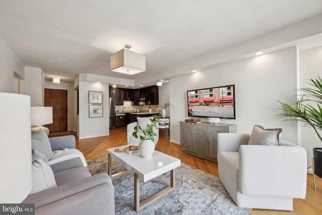 2555 Pennsylvania Ave NW Unit 918, Washington, DC 20037 - living room featuring light wood-type flooring and recessed lighting