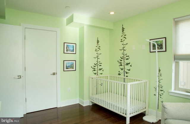 708 N 17th St, Philadelphia, PA 19130 - bedroom featuring wood finished floors, baseboards, recessed lighting, and a nursery area