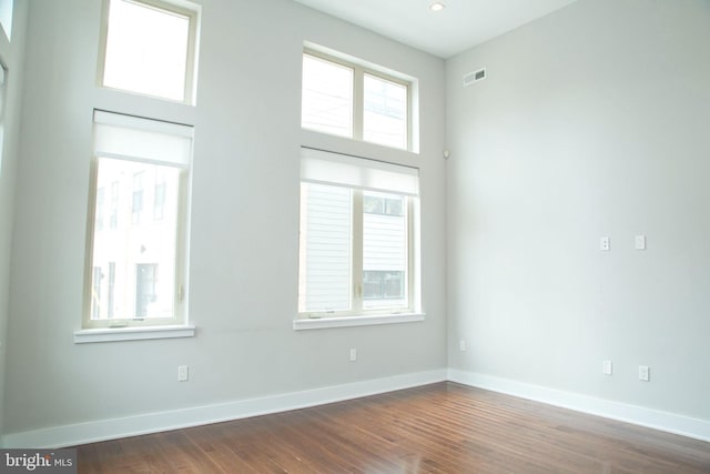 708 N 17th St, Philadelphia, PA 19130 - empty room with baseboards and dark wood-style flooring