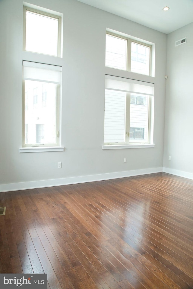 708 N 17th St, Philadelphia, PA 19130 - empty room with dark wood-style flooring and baseboards