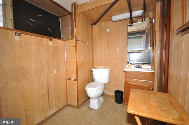 3324 Ryan Ave, Philadelphia, PA 19136 - bathroom with toilet, a sink, wood ceiling, wooden walls, and vaulted ceiling