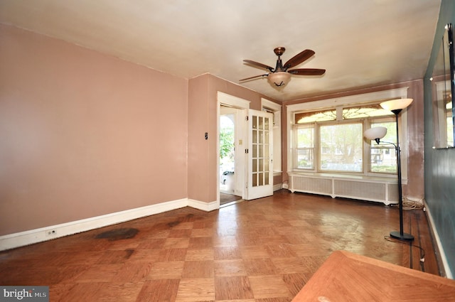 3324 Ryan Ave, Philadelphia, PA 19136 - unfurnished room with radiator, baseboards, and a ceiling fan