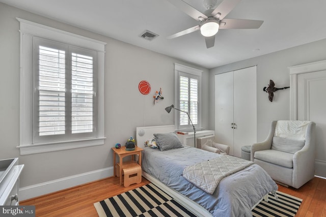 3805 Warren St NW, Washington, DC 20016 - bedroom featuring wood finished floors, a closet, baseboards, and a ceiling fan