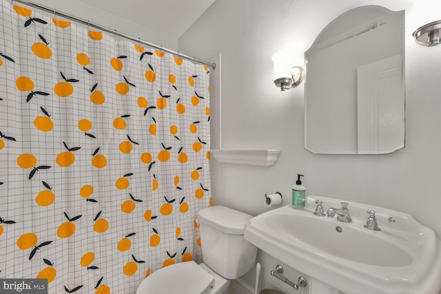 3805 Warren St NW, Washington, DC 20016 - full bath featuring a sink, toilet, and a shower with shower curtain