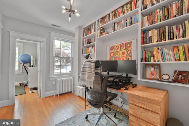 3805 Warren St NW, Washington, DC 20016 - office space featuring radiator heating unit, hardwood / wood-style flooring, baseboards, and a chandelier