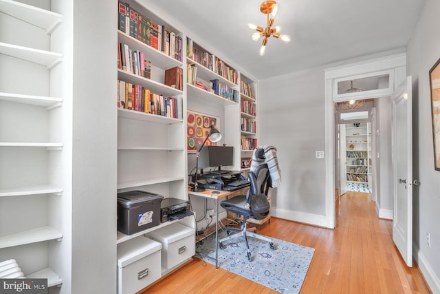 3805 Warren St NW, Washington, DC 20016 - office featuring light wood-style floors, baseboards, a chandelier, and built in features