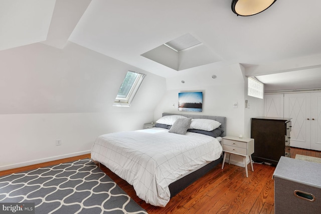 3805 Warren St NW, Washington, DC 20016 - bedroom featuring wood finished floors, a skylight, and baseboards