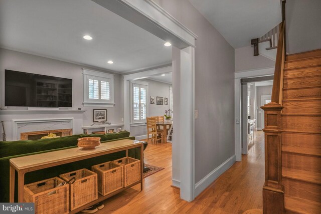 3805 Warren St NW, Washington, DC 20016 - hallway featuring light wood-style flooring, recessed lighting, stairs, and baseboards