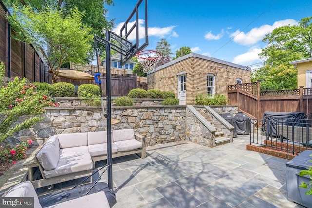3805 Warren St NW, Washington, DC 20016 - fenced backyard with an outdoor living space, a patio, and grilling area