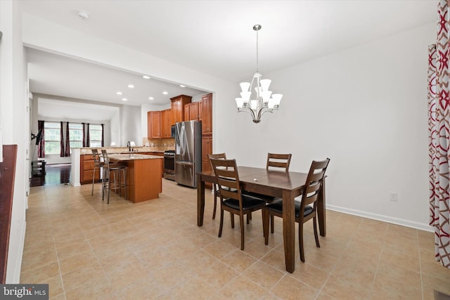 133 E General Grey Ct, Newark, DE 19702 - dining area with recessed lighting, a chandelier, light tile patterned floors, and baseboards