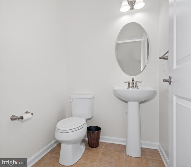 133 E General Grey Ct, Newark, DE 19702 - bathroom with toilet, baseboards, and tile patterned floors