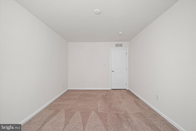133 E General Grey Ct, Newark, DE 19702 - spare room featuring baseboards and light colored carpet