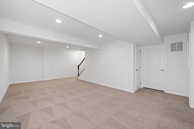 133 E General Grey Ct, Newark, DE 19702 - finished below grade area with light colored carpet, recessed lighting, baseboards, and stairway