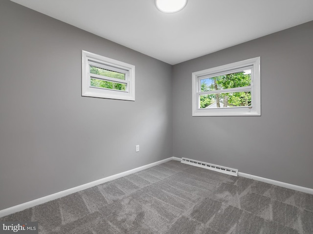 86 Summerfield Dr, Annapolis, MD 21403 - carpeted empty room with baseboard heating and baseboards