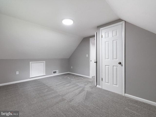 86 Summerfield Dr, Annapolis, MD 21403 - additional living space with vaulted ceiling, carpet floors, and baseboards