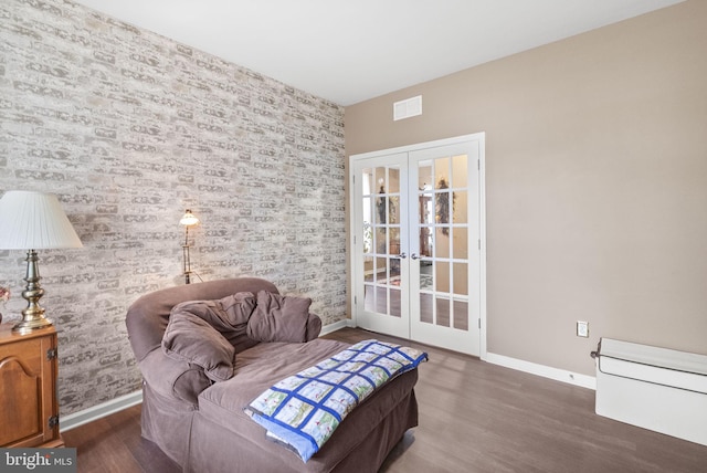 220 Wilshire Blvd, Woolwich Twp, NJ 08085 - sitting room featuring french doors, baseboards, wood finished floors, and wallpapered walls