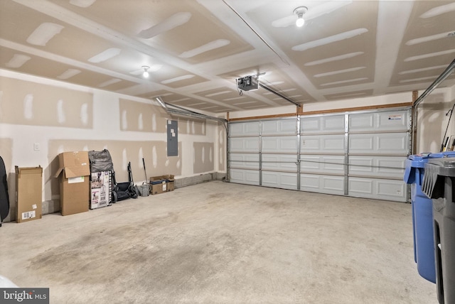 220 Wilshire Blvd, Woolwich Twp, NJ 08085 - garage featuring a garage door opener and electric panel