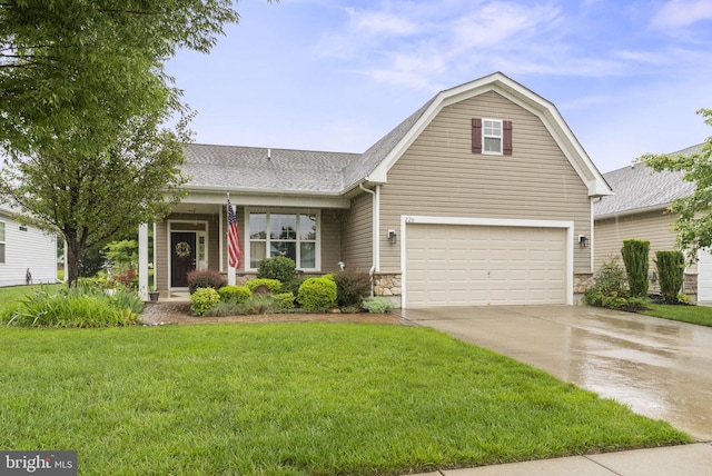 220 Wilshire Blvd, Woolwich Twp, NJ 08085 - view of front of home with driveway, a front yard, stone siding, a shingled roof, and a garage