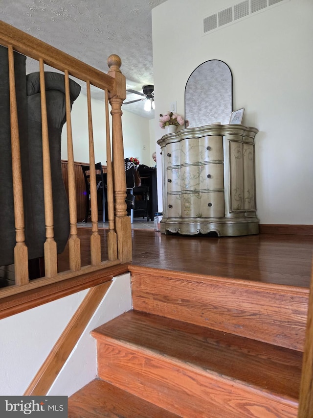 354 Rupert Ct, Millersville, MD 21108 - stairway with ceiling fan, wood finished floors, and baseboards