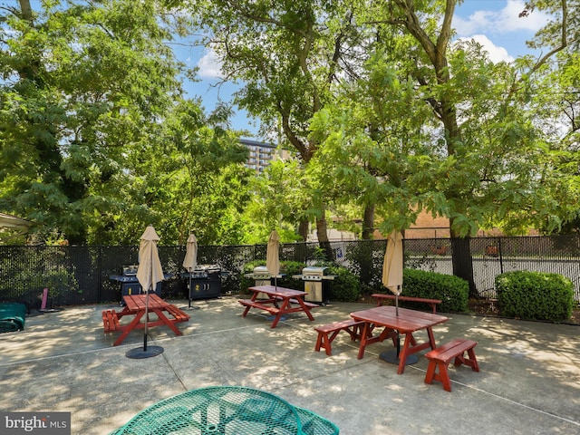 301 N Beauregard St Unit 905, Alexandria, VA 22312 - view of patio / terrace with outdoor dining area and a grill