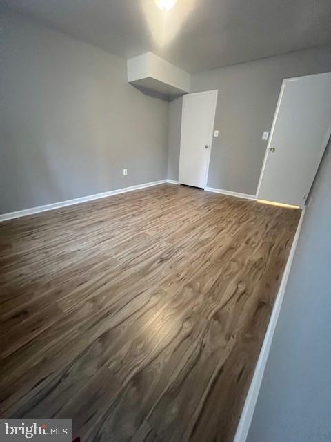 8485 Greenbelt Rd Unit 8485-T-1, Greenbelt, MD 20770 - bonus room featuring wood finished floors and baseboards