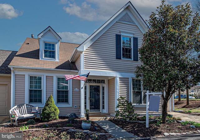 20464 Walsheid Ter, Ashburn, VA 20147 - view of front of home with roof with shingles and an attached garage