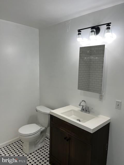 1910 Mcclellan St, Philadelphia, PA 19145 - bathroom with vanity, toilet, and baseboards