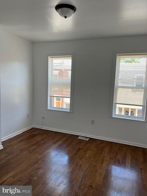 1910 Mcclellan St, Philadelphia, PA 19145 - unfurnished room with dark wood finished floors and baseboards