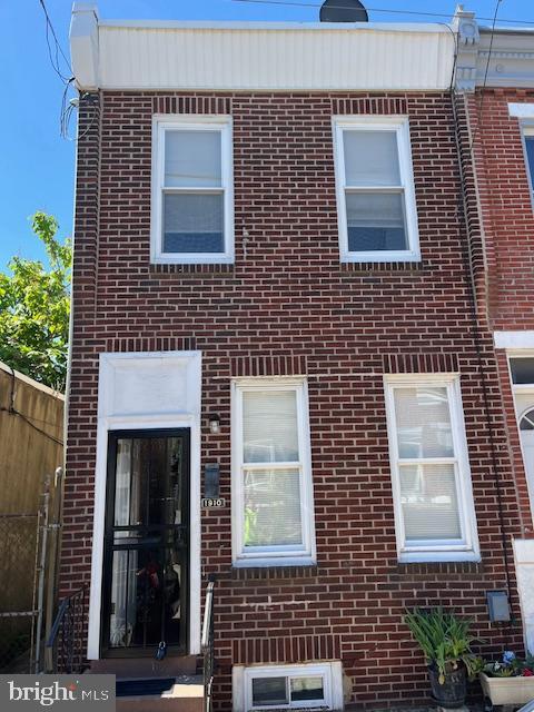 1910 Mcclellan St, Philadelphia, PA 19145 - view of front of home with brick siding