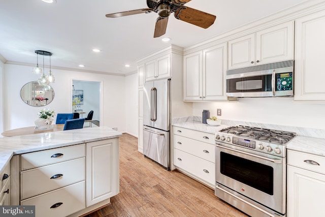 12209 Lake James Dr, Herndon, VA 20171 - kitchen featuring appliances with stainless steel finishes, ceiling fan, light wood-type flooring, white cabinetry, and recessed lighting