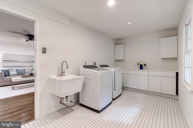 12209 Lake James Dr, Herndon, VA 20171 - washroom with washing machine and dryer, cabinet space, a ceiling fan, recessed lighting, and light floors