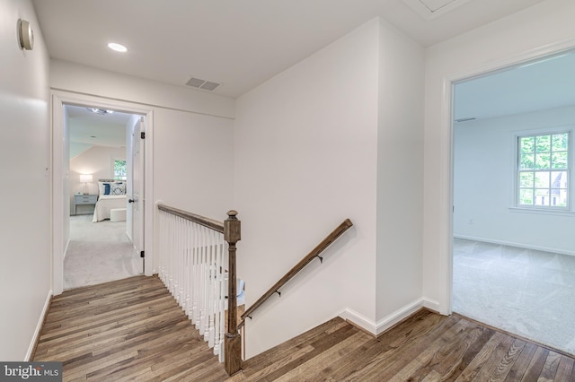 12209 Lake James Dr, Herndon, VA 20171 - stairs with wood finished floors, healthy amount of natural light, carpet, and recessed lighting