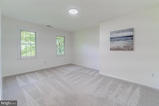 12209 Lake James Dr, Herndon, VA 20171 - unfurnished room with baseboards and light carpet